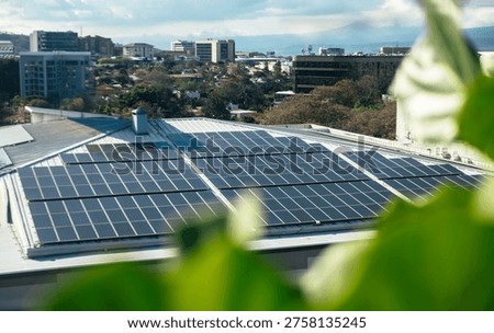 Rooftop solar panels generating clean renewable energy in city.