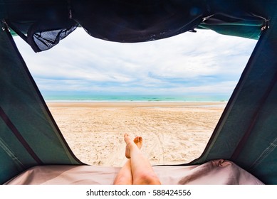 Rooftop tent camping by the beach