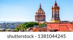 Rooftop view of the Church of the Immaculate Conception in popular retirement town San Miguel de Allende, Mexico