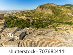 The rooftops of Petralia Sottana stretching towards the Mother Church in the Madonie Mountains, Sicily during summertime