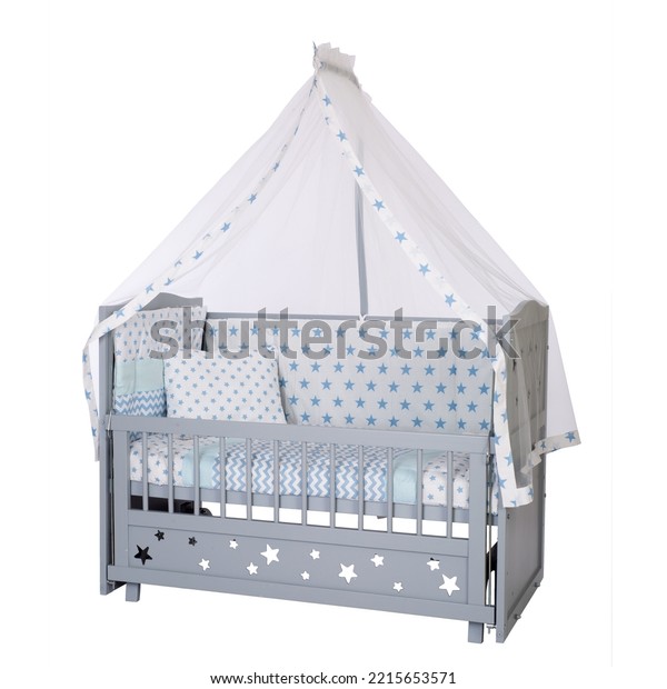 room for baby, bedding, pillow and quilt
blanket, bright interiors, accessories, white baby crib with canopy
isolated on white
background