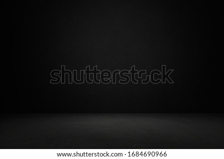 Room with black concrete wall background.