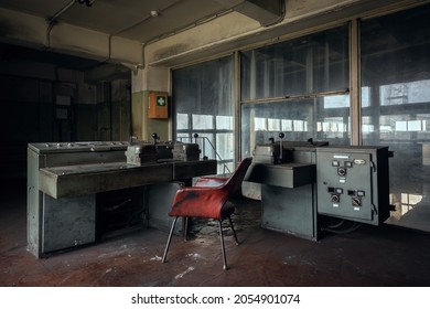 A Room With A Control Panel Of An Abandoned Factory. Mechanical Control Panel For Equipment