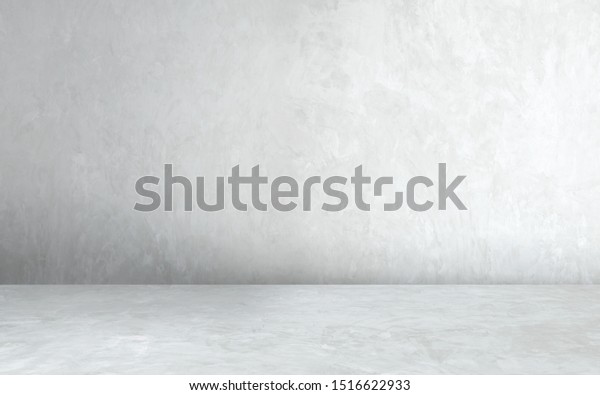 Room empty of cement\
floor with gray room cement or concrete wall texture background and\
sun light.