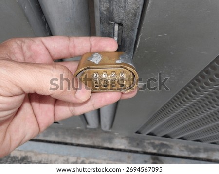 room gate with a pin code padlock