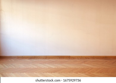 Room interior with wooden floor in empty apartment