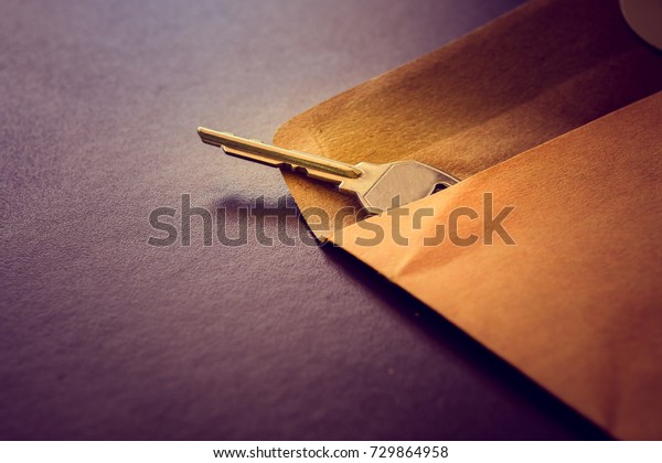 The room key in envelope, Business Delivery\
concept.Vintage tone