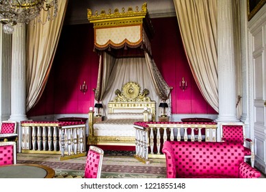 Room N Versailles. Golden Room Details With Rose Furniture. Curtains Covering The Bed