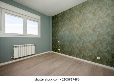 Room With Plain Green Wall And Another One Painted In Green Draped With Radiator Under The Window