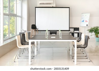 Room With Projector Prepared For Conference In Office