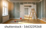 Room in renovation in elegant apartment for relocation with paint bucket and  Flattened drywall walls