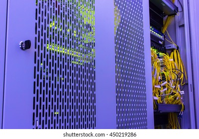 room with rows of server hardware in the data center