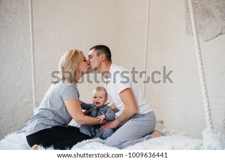 Similar – happy family playing at home on the bed