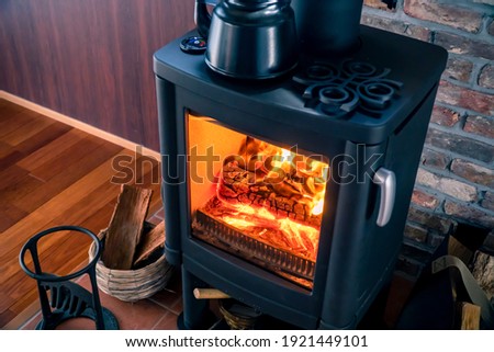 A room with Wood-burning stove.