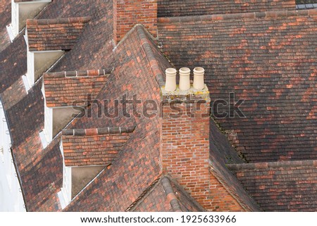 Rooves of a row of old terraced houses in Warwick, UK, aerial view