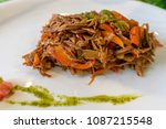 Ropa vieja, traditional Cuban national dish made of shredded beef and vegetables with tomato based sauce, peppers and onions served in a restaurant in Old Havana