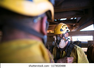 Rope Access Miner Welder Preparing Using Safety Dust Protection P3 Mask Before Working In Confined Space At Construction Site Perth, Australia 