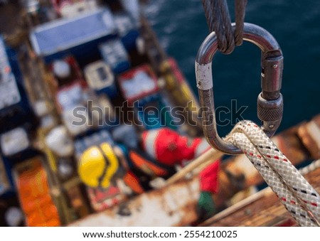Rope access worker, working on oil rig