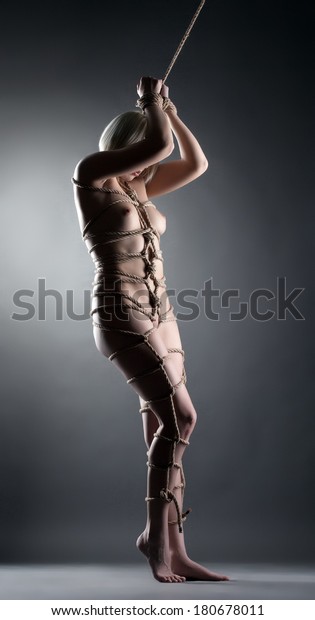 Nude Woman In Bondage