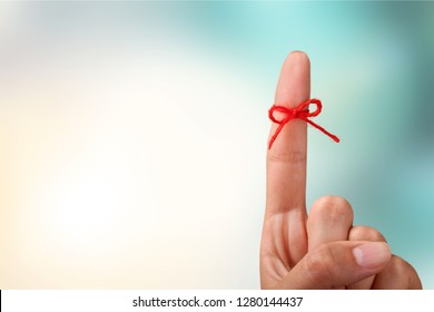Rope bow on finger pointing