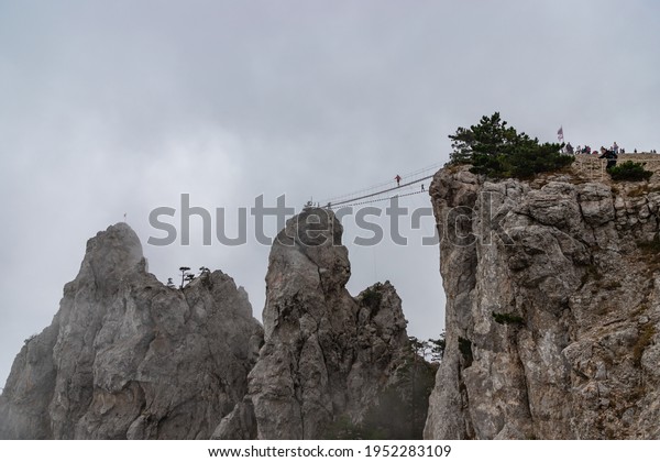 Rope bridge\
over the precipice on Mount\
Ai-Petri