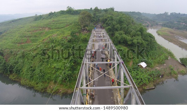 rope\
jump from bridge in bandung, west java,\
indonesia