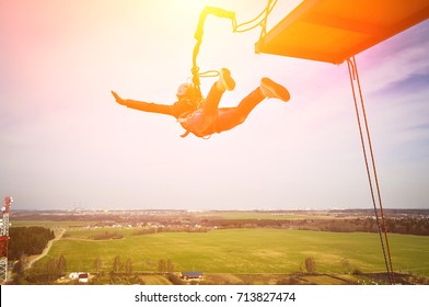 Rope Jumping Or Bungee Jumping, Girl Jumping To The Bottom, Extreme Background