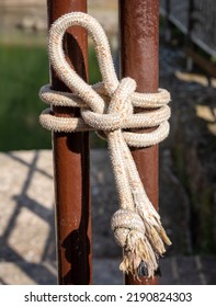 Rope, Knot. Dark Red Door. Light And Shadow. 