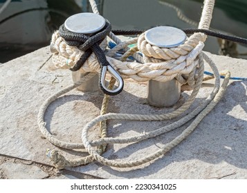 rope and old Marina bollard on moorage