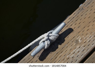 Rope on tie up at boat dock.