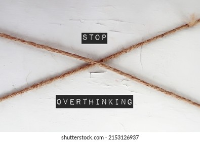 Rope On Wall With Text STOP OVERTHINKING, Self Remind To Break Cycle Of Thinking Too Much, Becoming Self-aware And Drive Towards Better, Faster Decisions