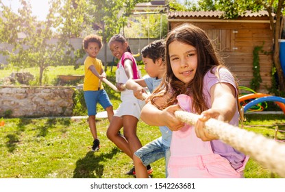 Rope Pulling Game Portrait Of Kids In Summer Camp