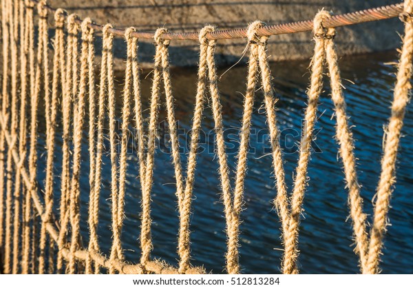 Rope with tied and\
knot of a hanging bridge