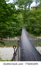 Rope Walkway Through The Treetops In A Rain Forest. Suspension Bridge, Walkway To The Adventurous, Cross To The Other Side. View On Old Wooden Dangerous Rope Bridge. 