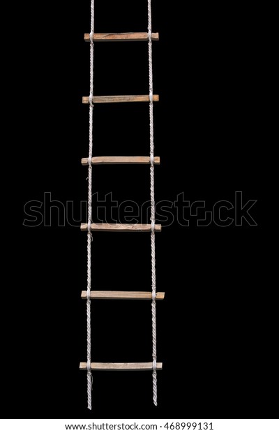 Rope wooden ladder isolated with clipping path\
on black background