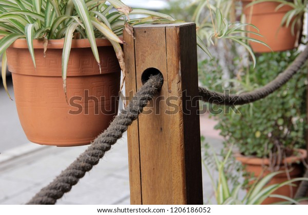 roped wood\
railing