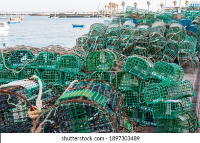 Ropes, nets and handcrafted fishing traps for the octopus, lobsters and crabs in the fishing port of Cascais, Portugal