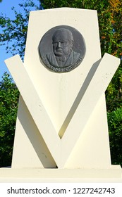 ROQUEBRUNE-CAP-MARTIN, FRANCE -22 APR 2018- View Of A Liberty Road V Marker With A Plaque Commemorating Sir Winston Churchill In  Roquebrune-Cap-Martin On The French Riviera.