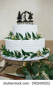 Ros, CA - January 10, 2021: Two Layer Wedding Cake With Mr And Mrs Topper For A Couple Who Loves The Outdoors. 