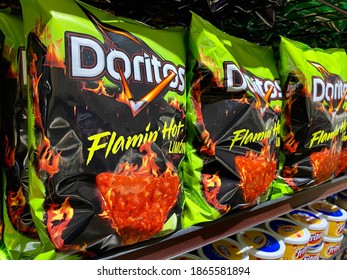 Ros, CA - November 24, 2020: Bags Of Doritos Flamin’ Hot Chips Variety On Store Shelf.