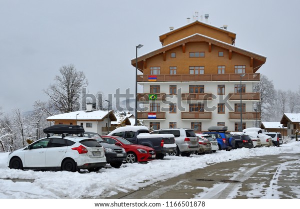 Rosa Khutor,\
Sochi, Russia, January, 25, 2018. Cars are parked at the hotel in\
the Olympic village on Rosa\
Khutor