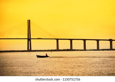 Rosario - Victoria Bridge Over Parana River At Dusk In Rosario City, Argentina  