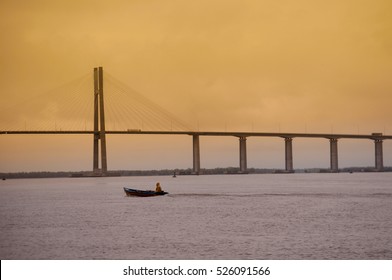 Rosario - Victoria Bridge Over Parana River  In Rosario City, Argentina  At Sunset