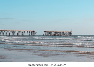 Rosarito beach with broken pier due to high waves - Powered by Shutterstock