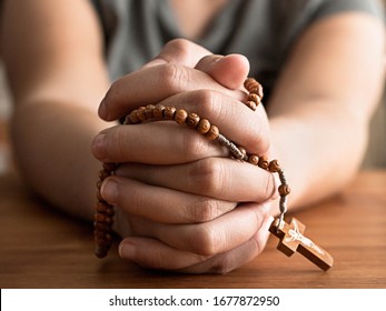 Rosary In Child Hands Pray