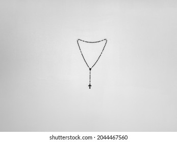 A Rosary Hanging On A Wall