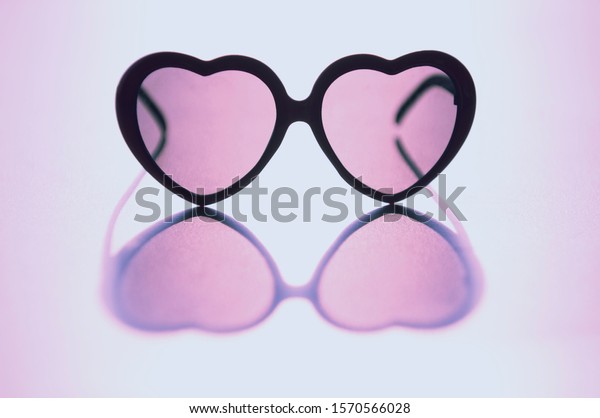 rose colored heart shaped glasses