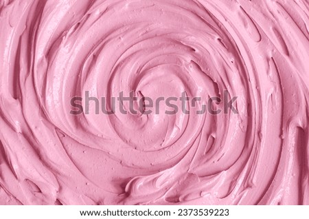 Rose cosmetic clay (alginate modeling facial mask, make-up blusher, lipstick, lip gloss) texture close-up, selective focus. Abstract background with circle brush strokes.
