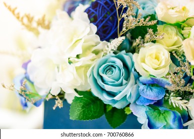 Rose fake flower and Floral background. rose flowers made of fabric. The fabric flowers bouquet. Colorful of decoration artificial flower