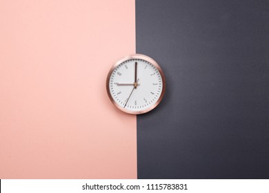 Rose Gold Clock On Pastel Pink And Grey Background. Minimal Idea Business Concept. 